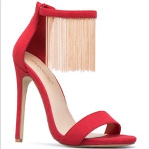 Red heels with gold micro chain accents